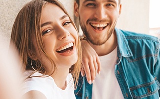 Couple with healthy smiles thanks to Reno dentist