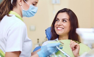 happy patient enjoying the benefits of dental crowns in Reno