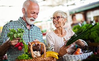 older couple shopping for groceries together 