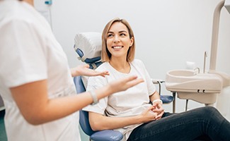 Patient smiles at dentist