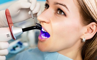 Dental patient is treated with special light?