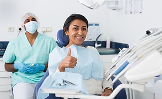 a patient smiling during her dental appointment in Reno