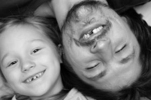 Father and daughter with missing teeth need their emergency dentist 