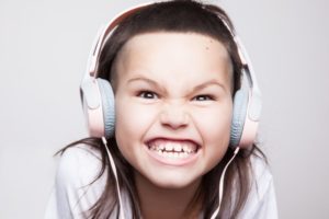 girl wearing headphones