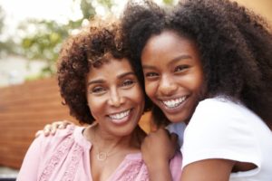 parent and child hugging each other