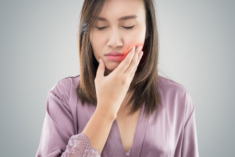 woman frowning from jaw pain