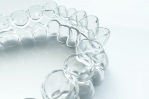 An aligned set of clear alignment trays from Invisalign in Reno