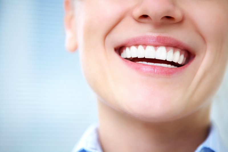 female smiling and showing off white smile